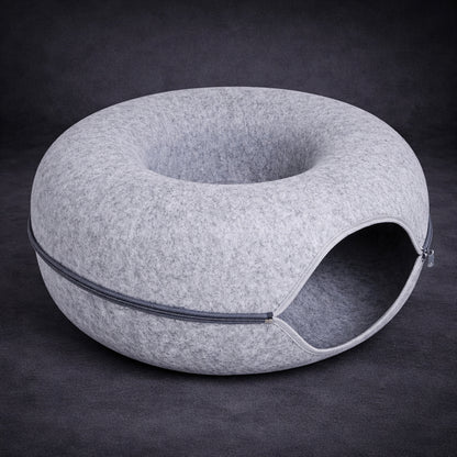Warm cat cave bed with cozy enclosed design